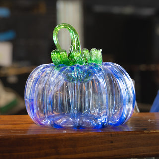 blue blown glass pumpkin with a green stem